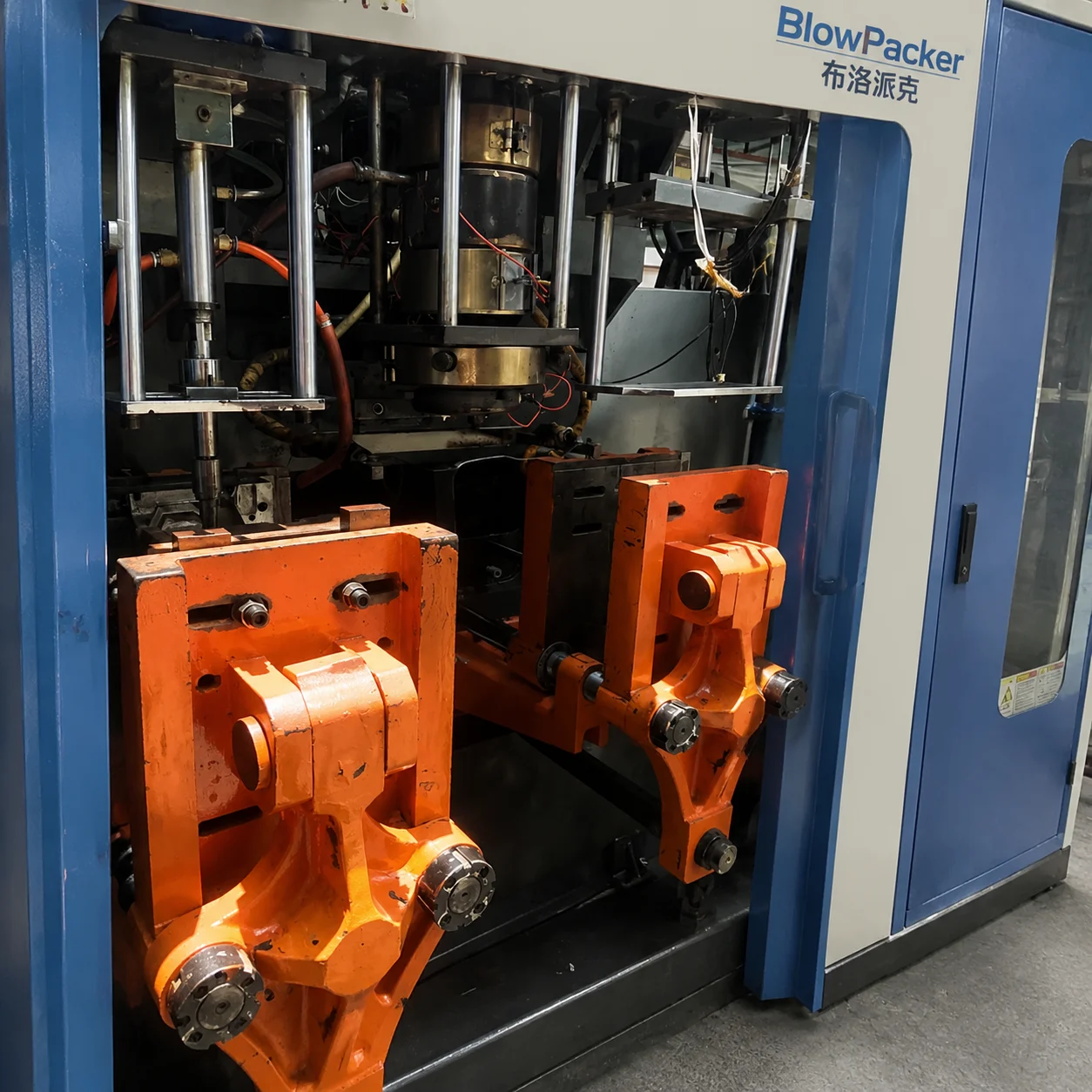 BlowPacker heavy-duty industrial blow molding machine manufacturing and assembly workshop floor